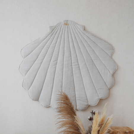 Tapis de jeu en forme de coquillage sable